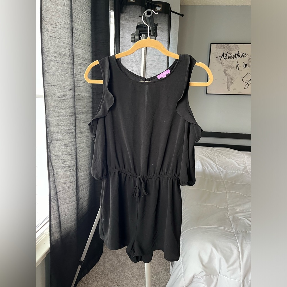 Women’s black romper with half sleeves